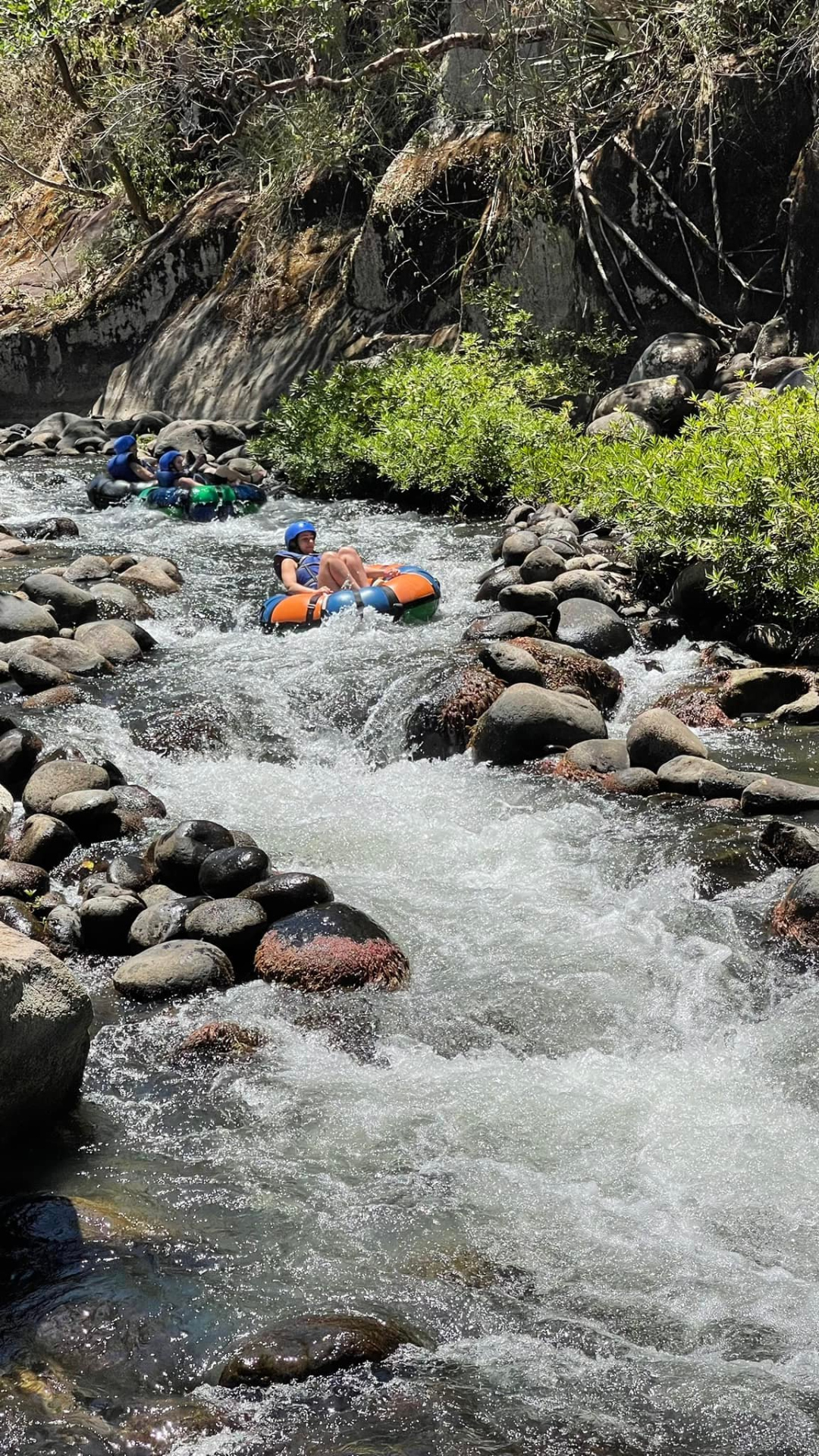 River tubing through rapids